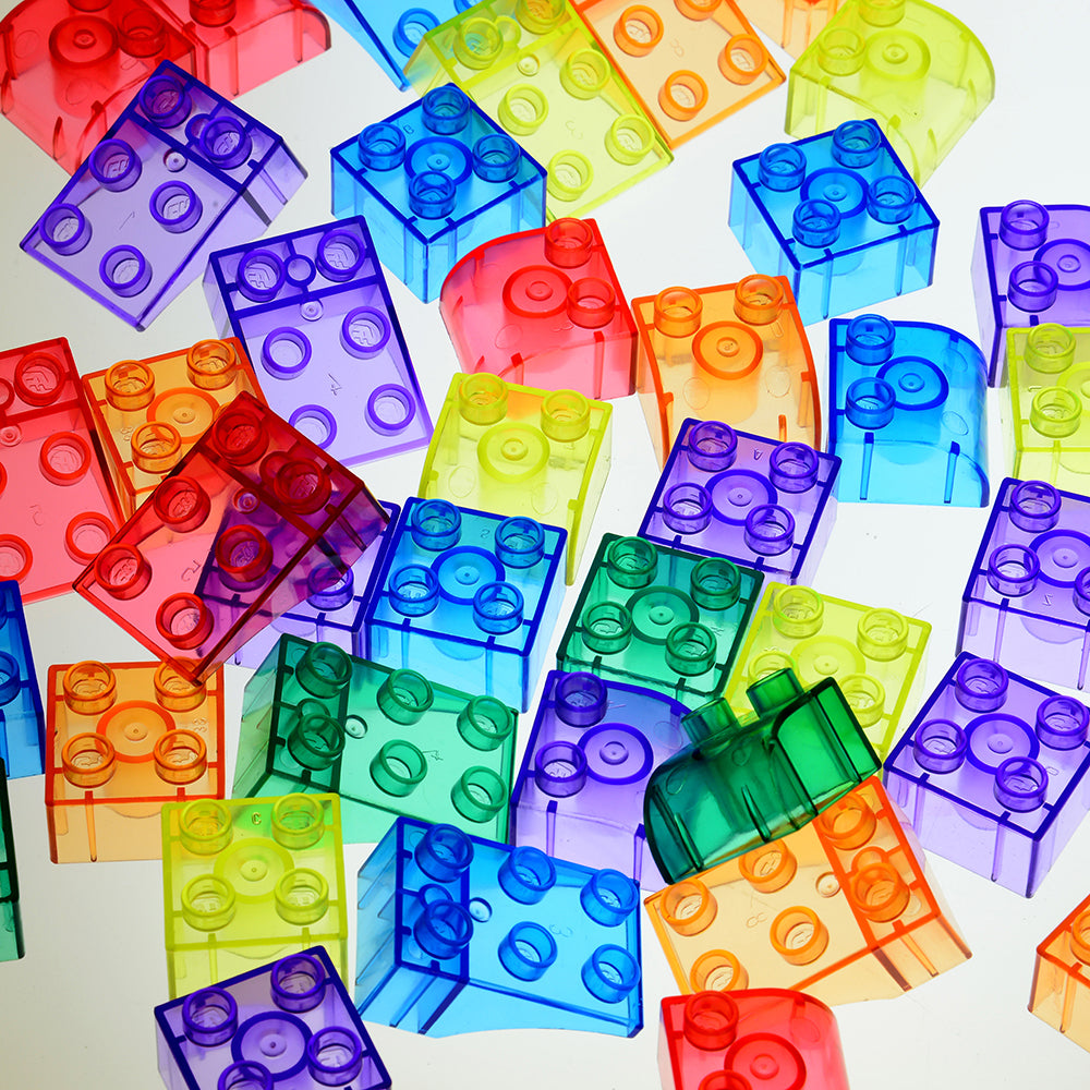 Close-up of Transparent Preschool Bricks on Light Table 