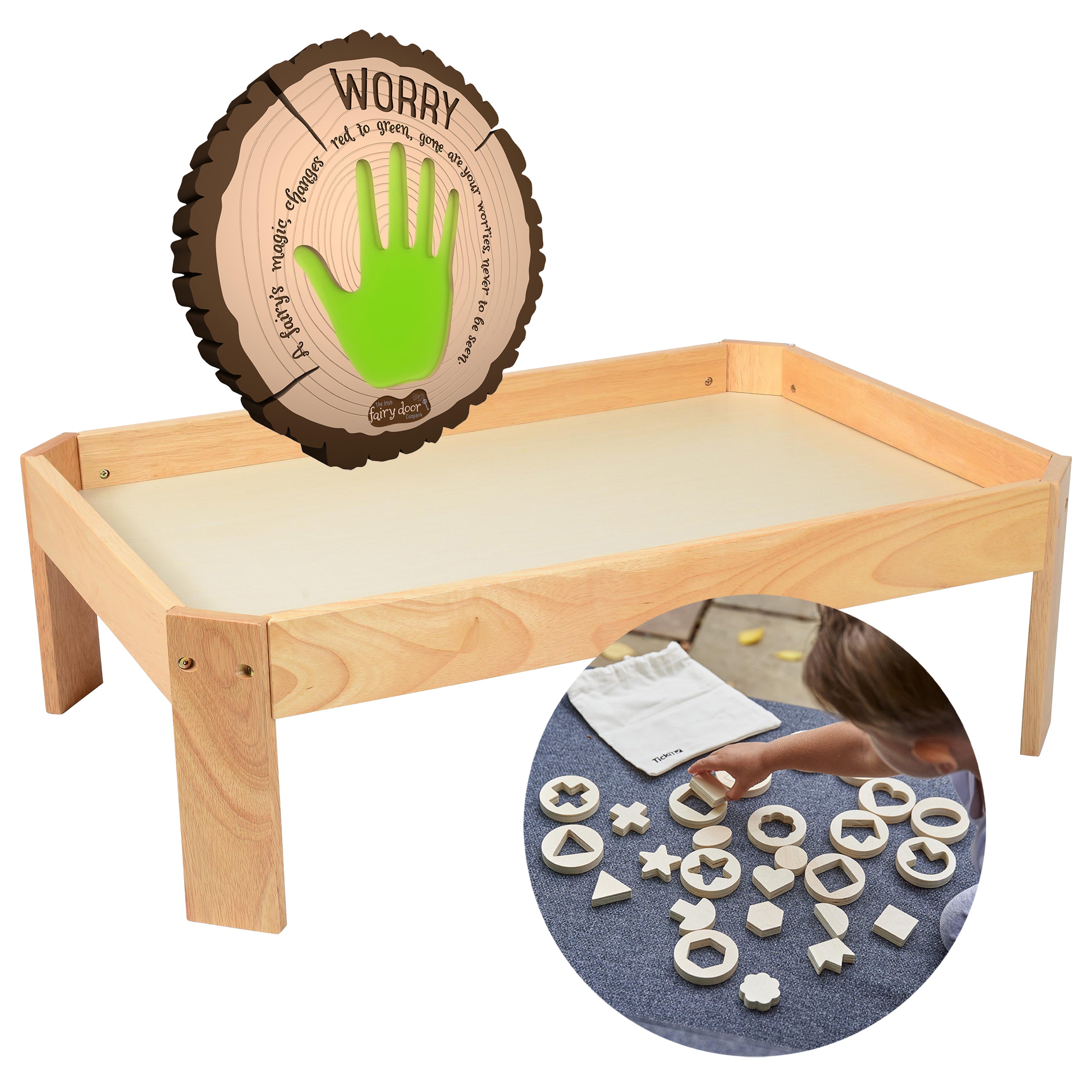 Wooden activity table with a circular wooden sign and inset showing hands playing with shapes.