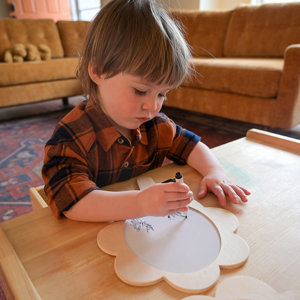 Toddler Drawing on Write & Wipe Surface of Feelings Mirror