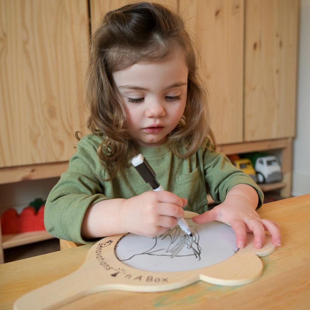 Toddler Scribbling on What Are You Feeling? Emotion Mirror