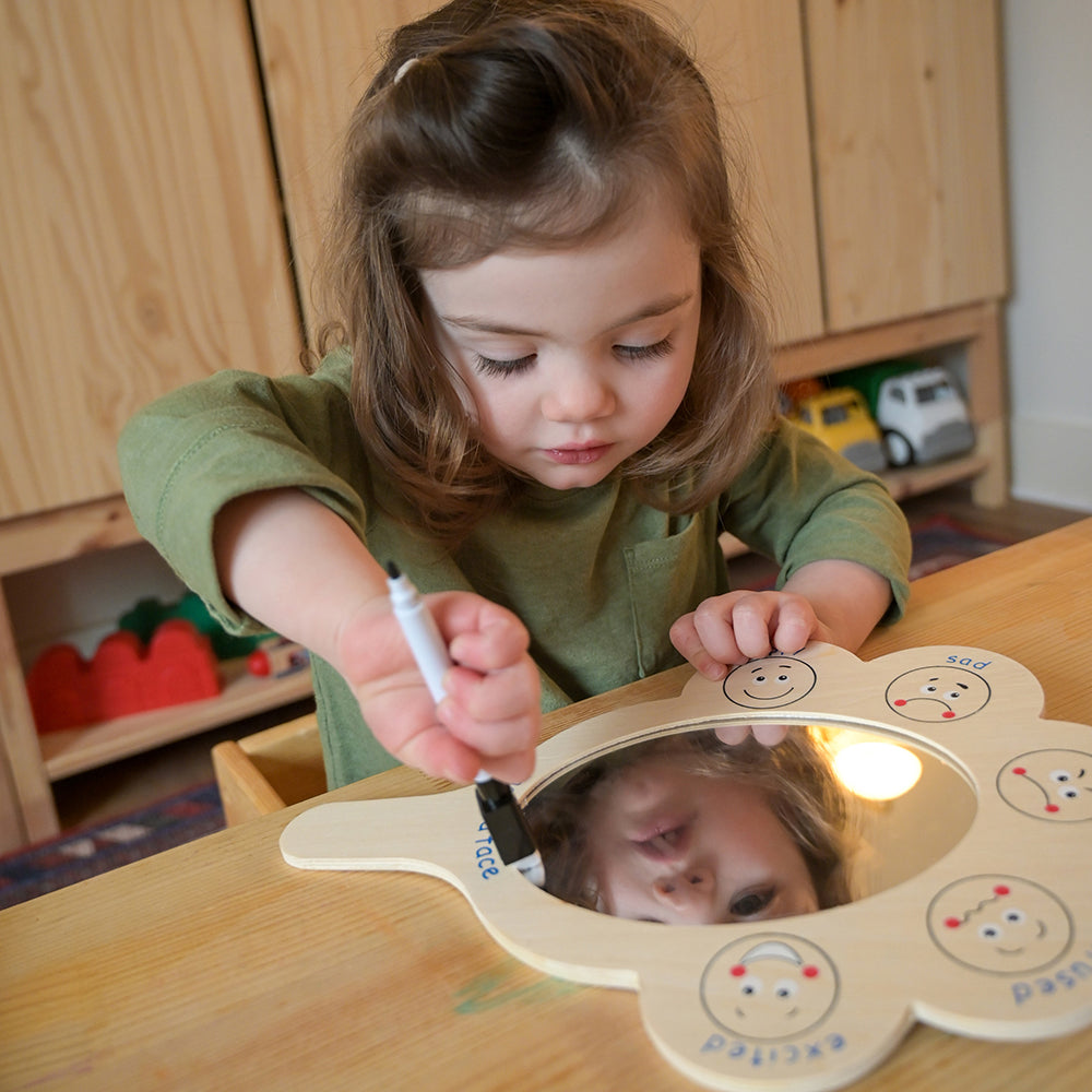 Toddler Interacting with Mirrored Side of What Are You Feeling? Emotion Mirror 