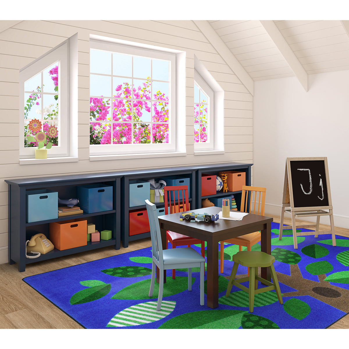 Children's playroom with a desk, chairs, and colorful storage units.