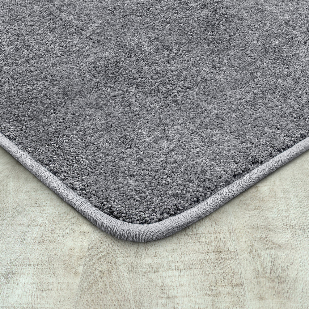 Serged Edges of Rectangular Silver Area Rug