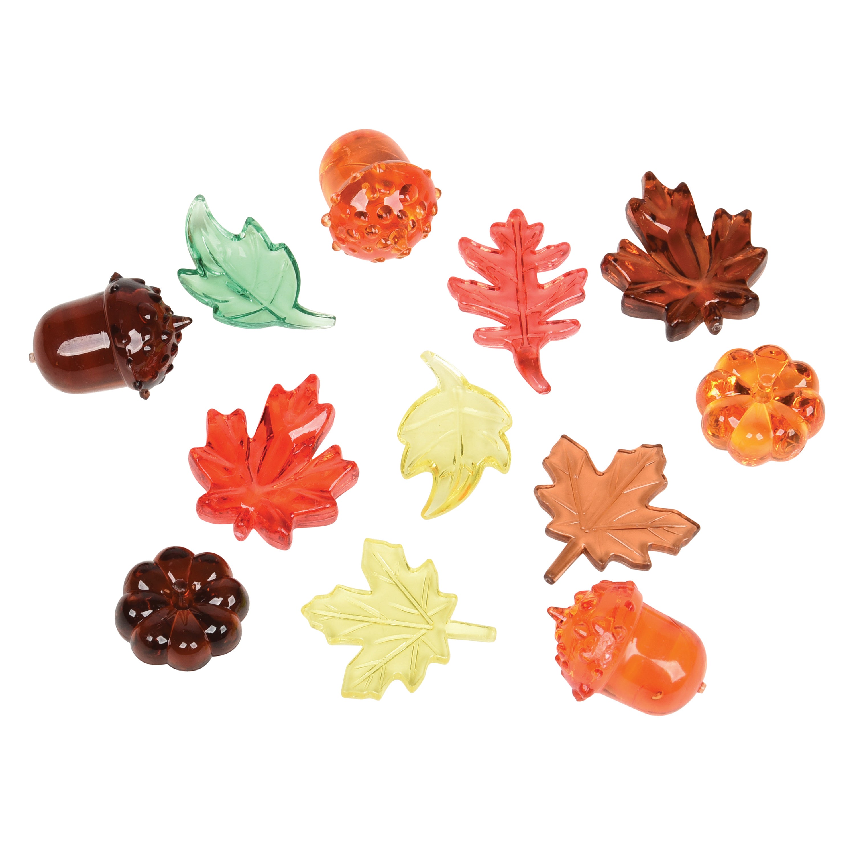 Colorful autumn-themed figurines including leaves and acorns on a white background