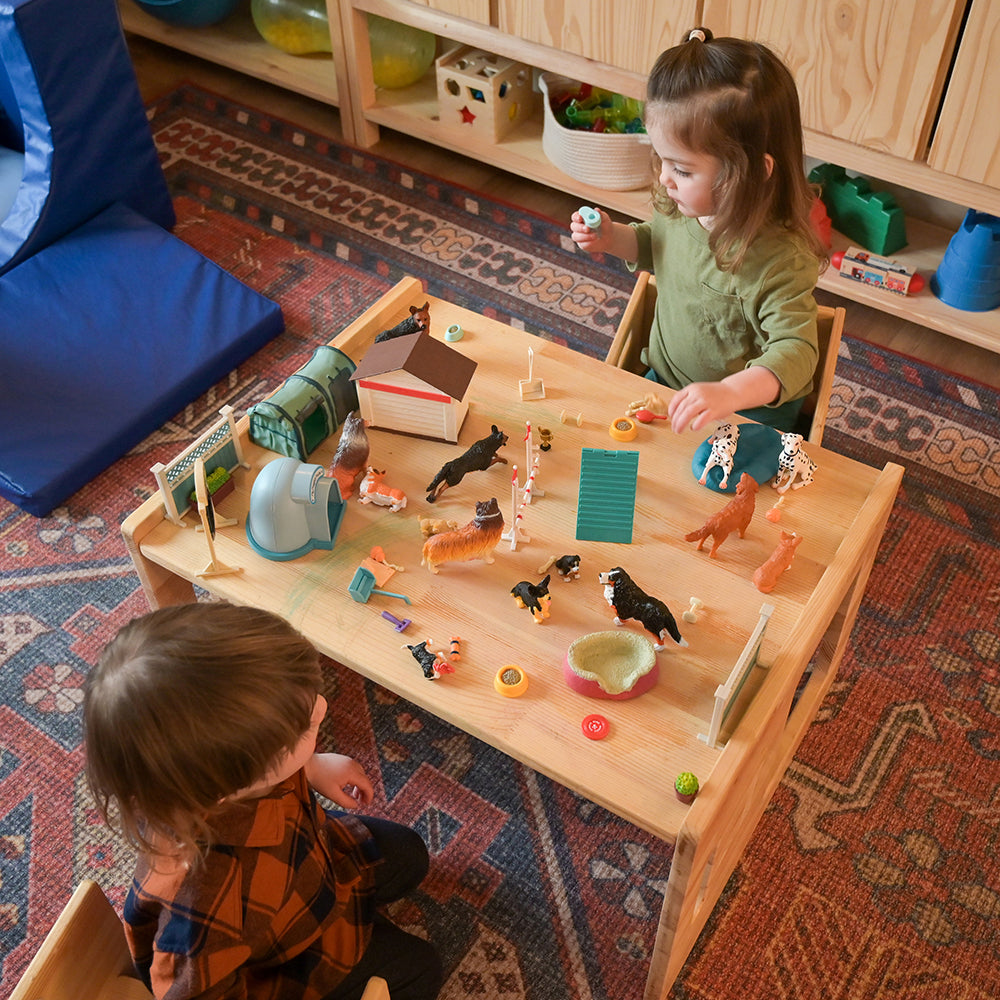 Two Toddlers Playing with Dog Academy Training & Agility Playset