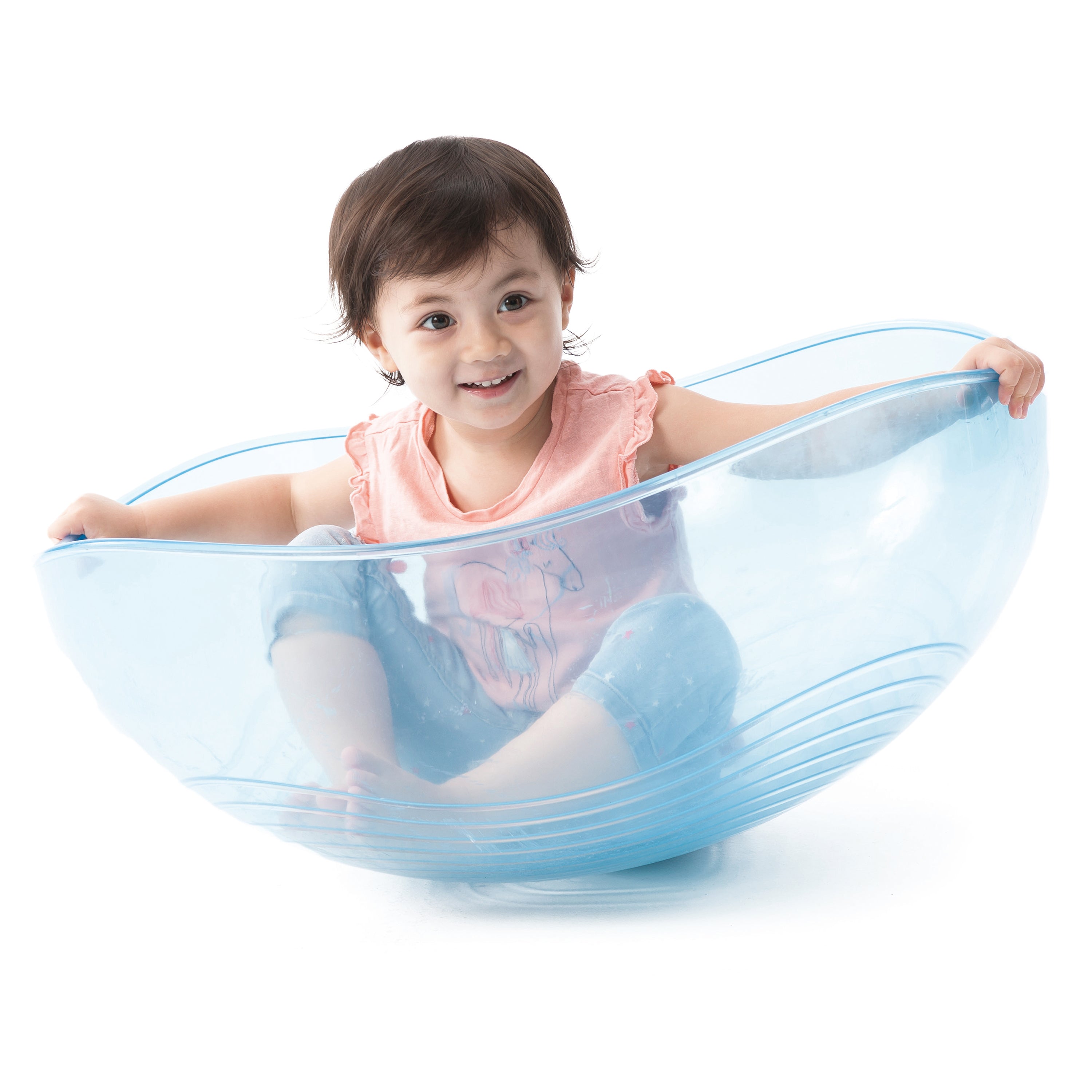 Child playing in a blue plastic bowl on a white background