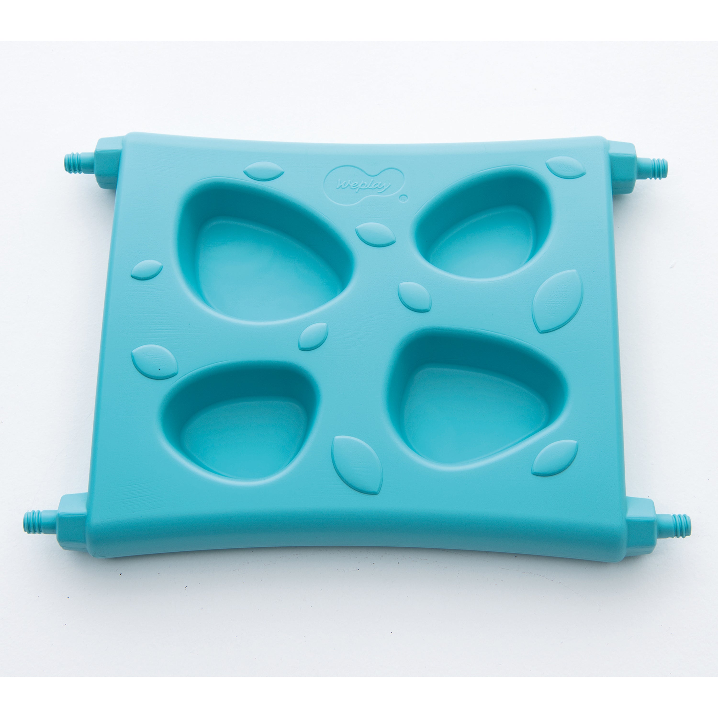 Turquoise plastic piece with four compartments on a white background