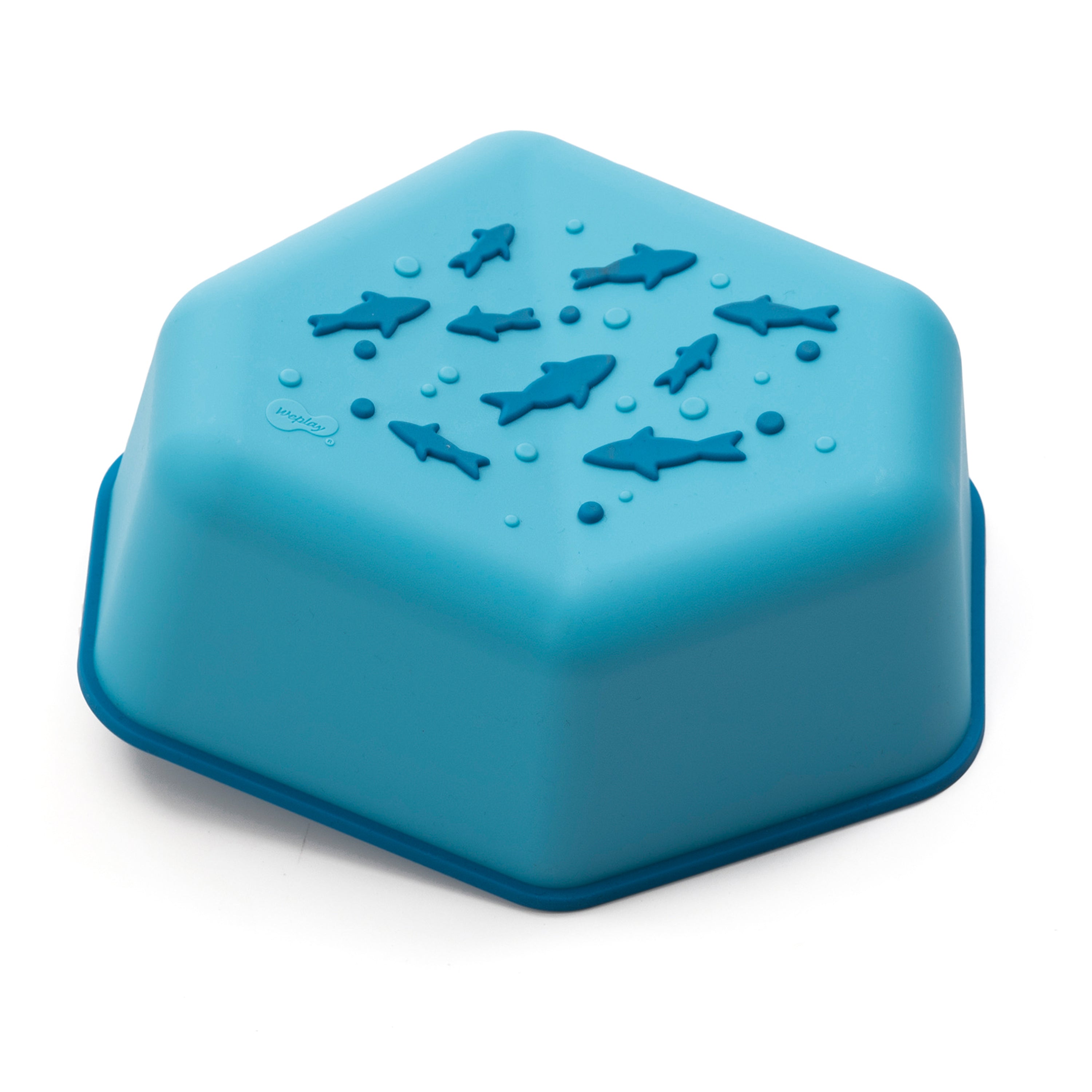 Blue stepping stone with shark shapes on a white background