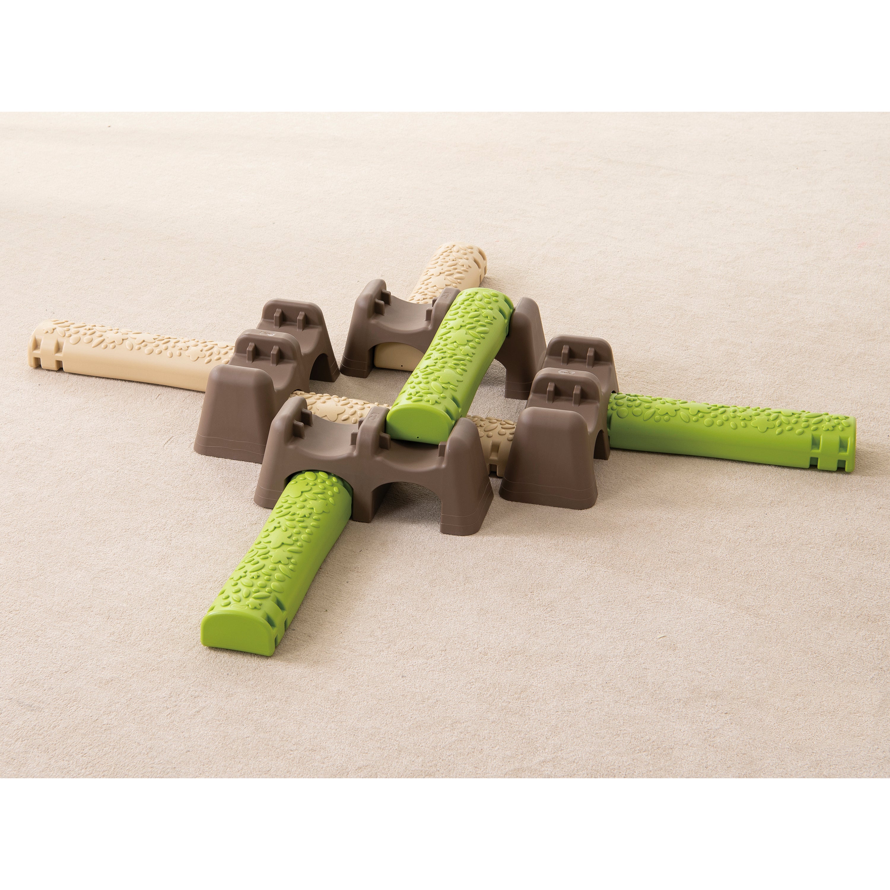 Brown, beige and green balance toy on beige carpet