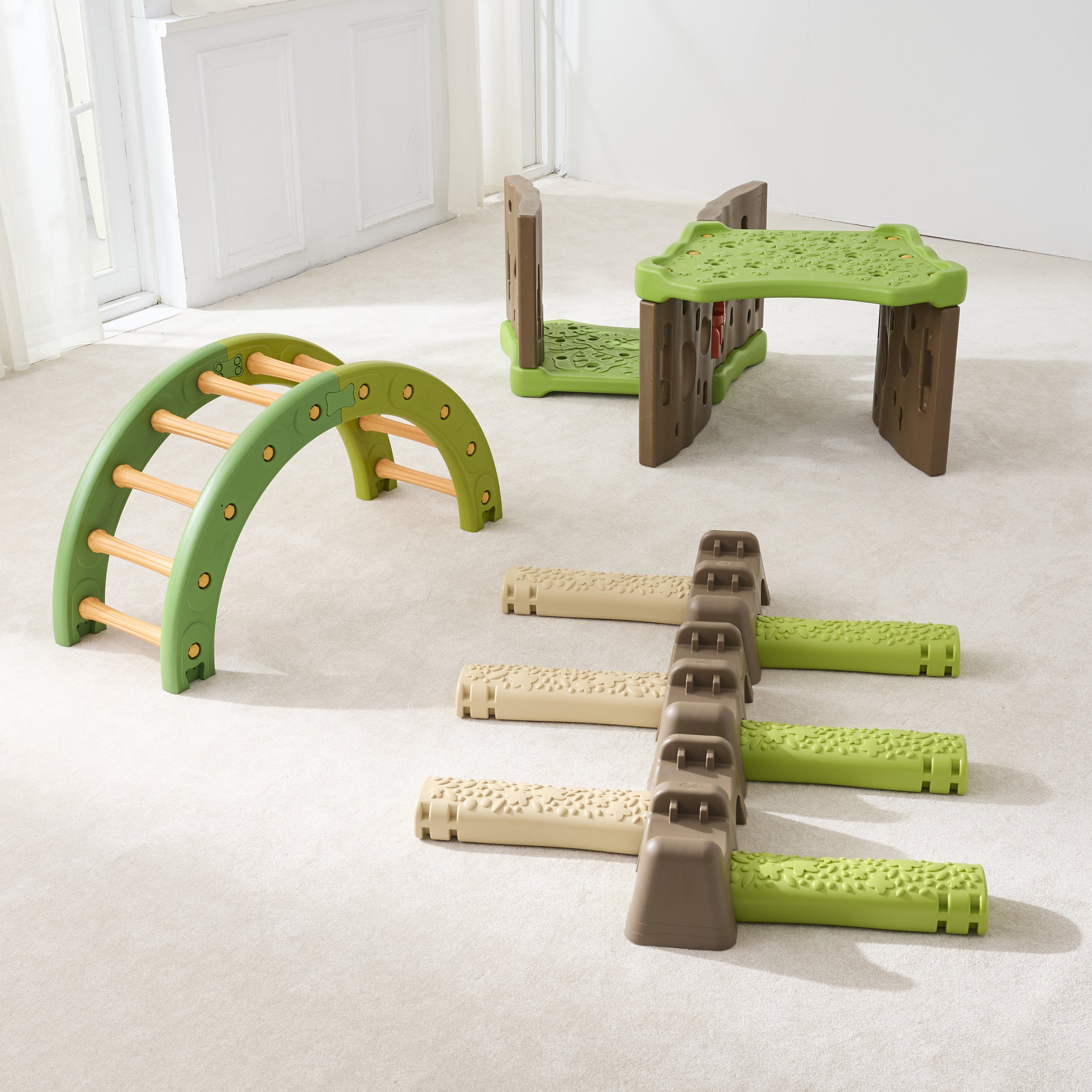 Children's play structure with green and brown elements on a light floor.