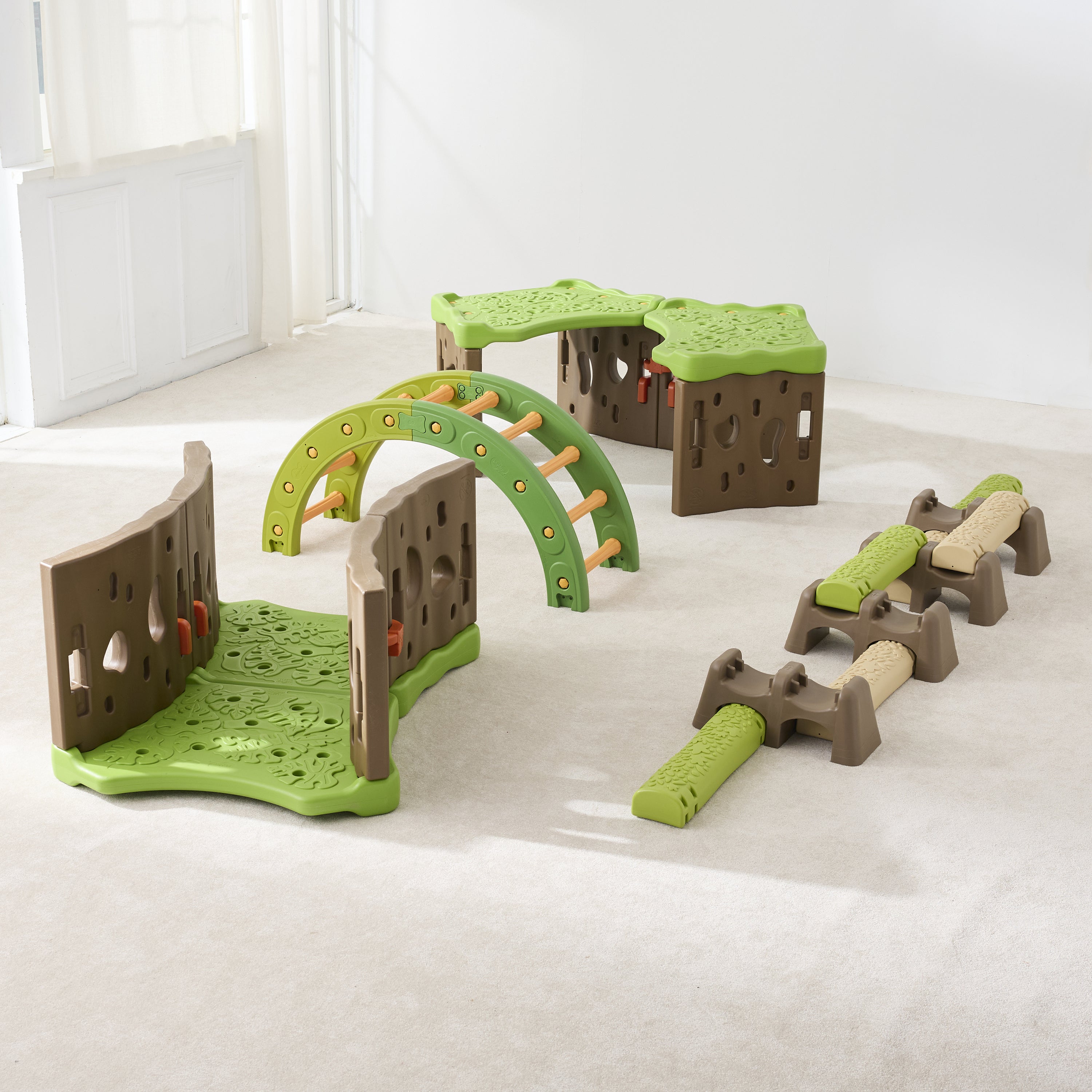 Children's playset with green and brown structures on a light gray floor.