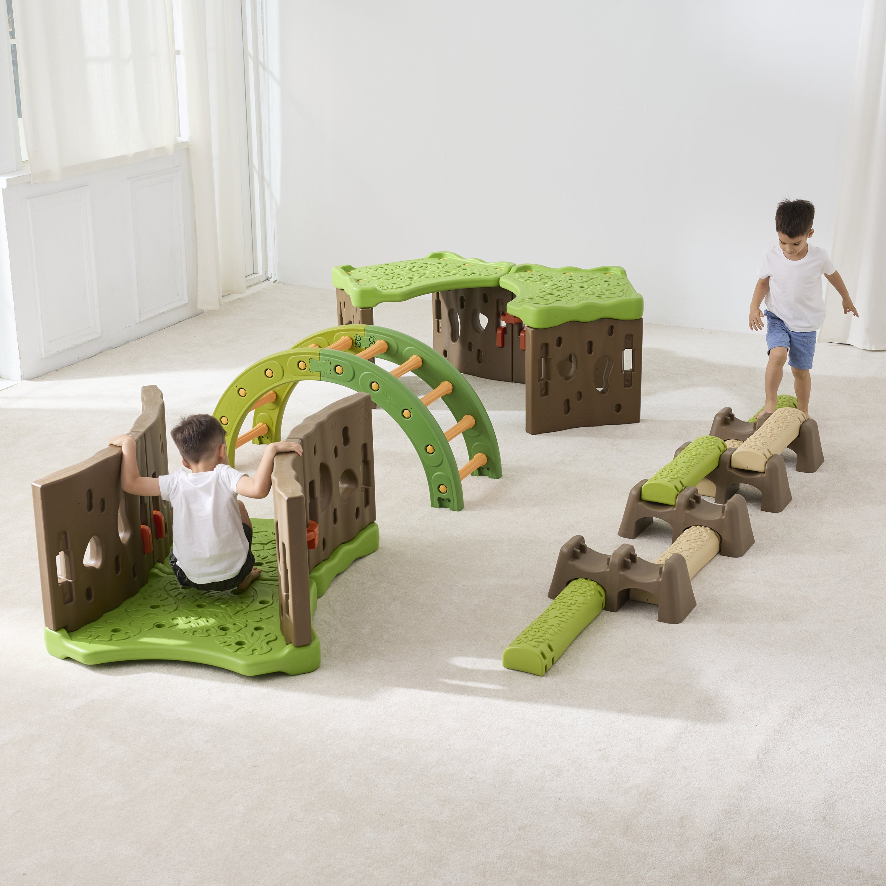 Children playing with a green and brown playset in a bright room.