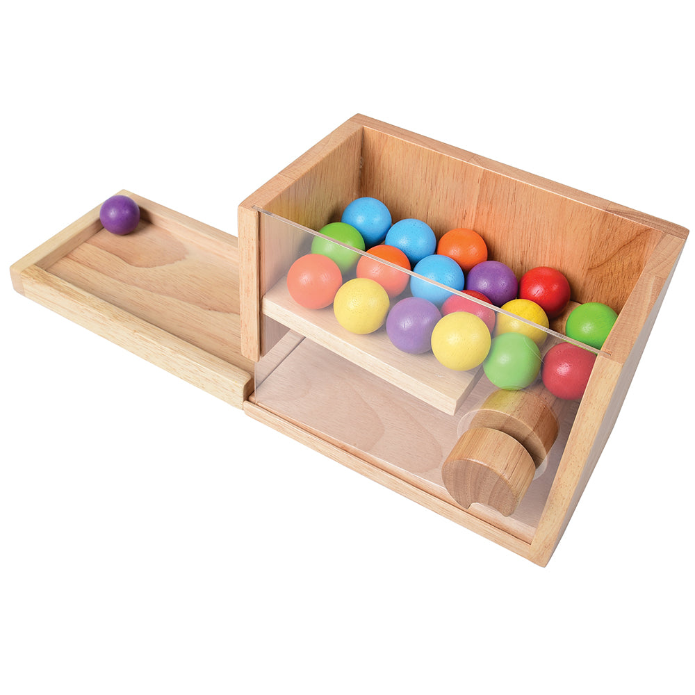 Simple Machine with Visible Mechanism and Brightly Colored Balls