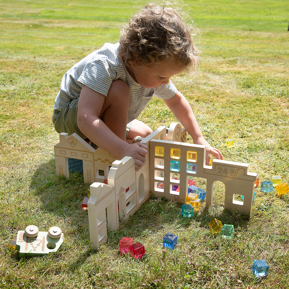 Child Having Fun with Tactile Town Discovery Dividers 