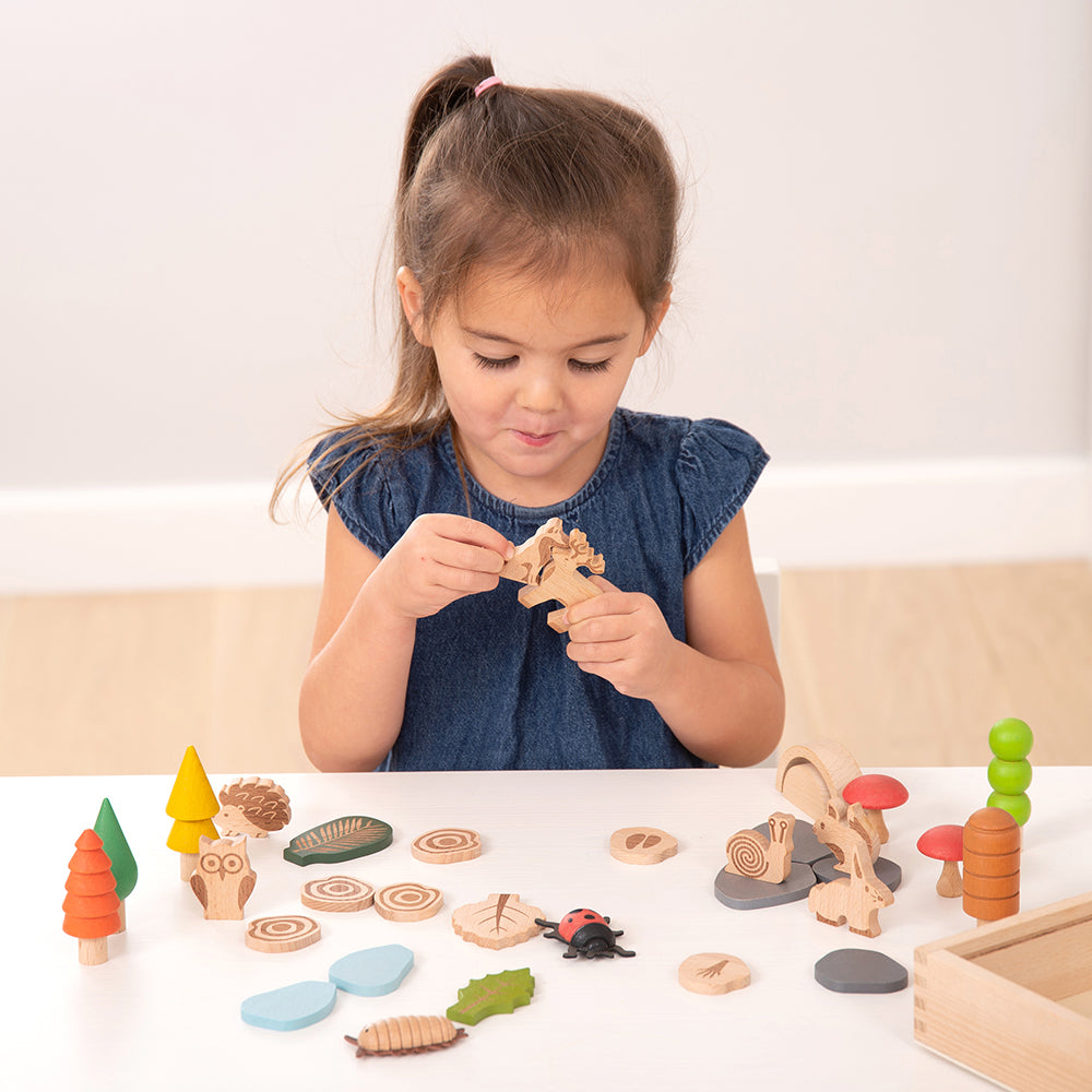 Kid Interacting with Woodland Trail Discovery Set