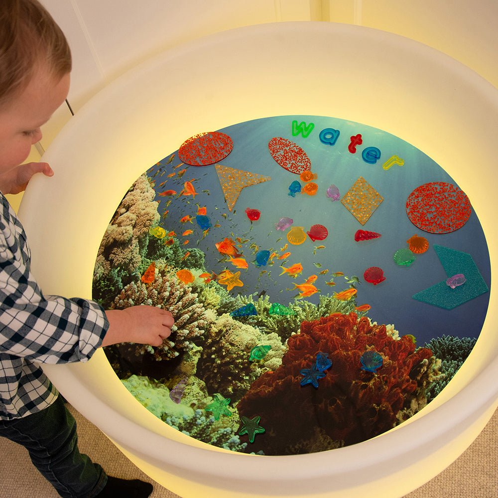 Exploring the Sea with Ocean Themed Play Mat for Light Tables