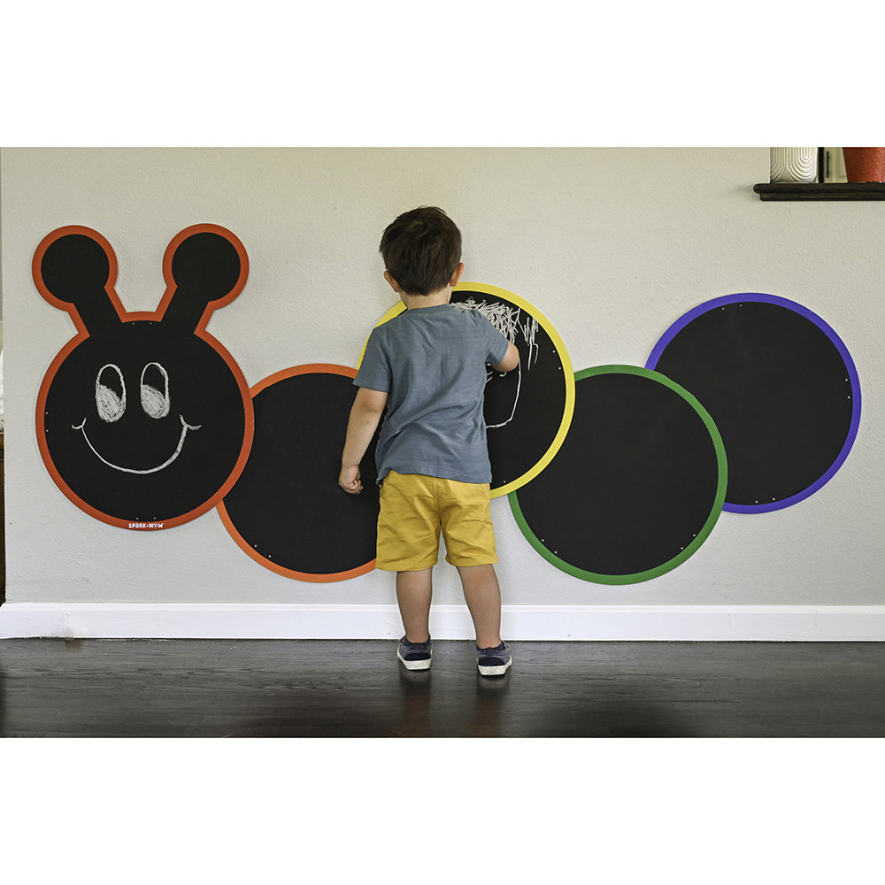 Kid Drawing on Multiple-Panel Outdoor Chalkboard in the Shape of a Giant Caterpillar