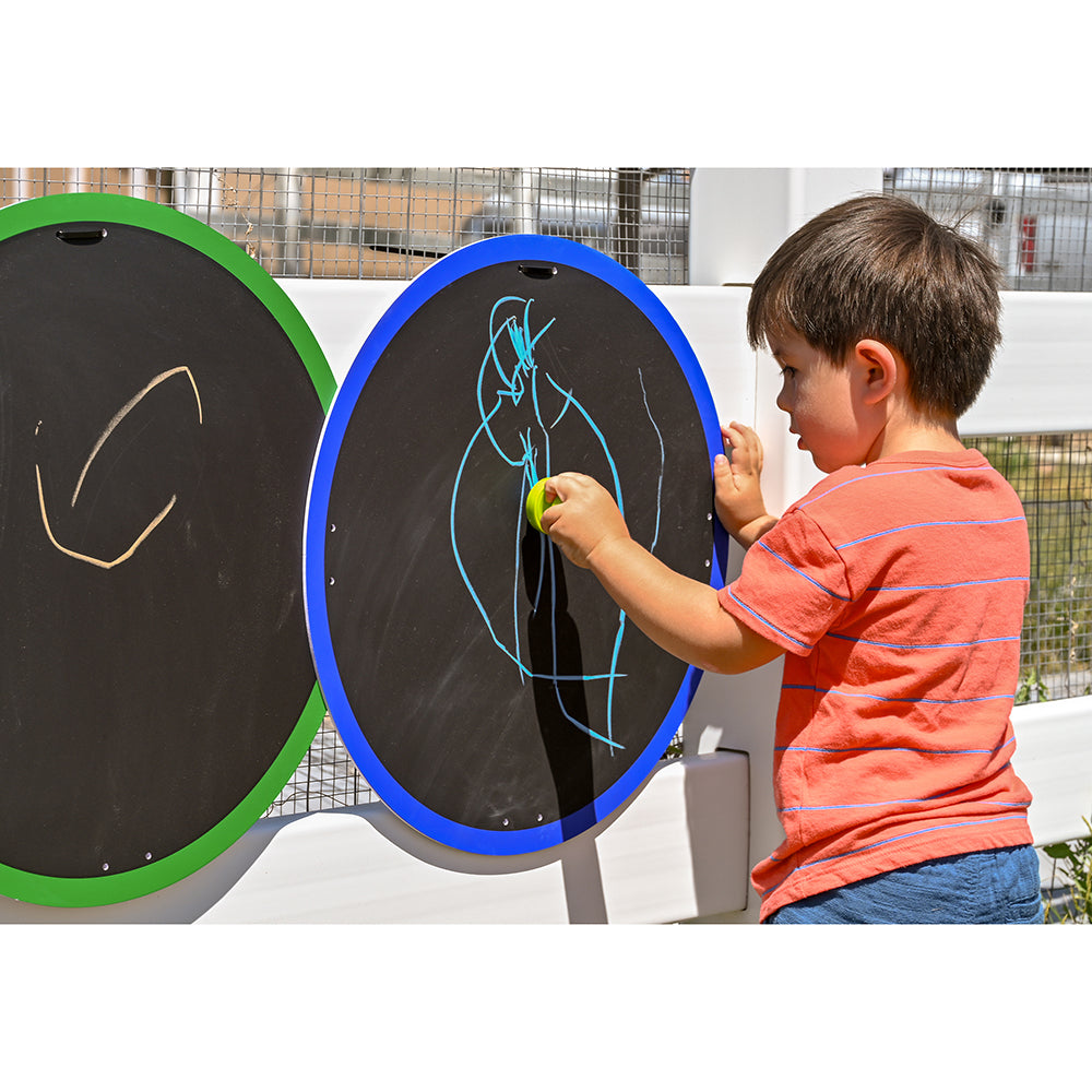 Toddler Drawing on Outdoor Chalkboard