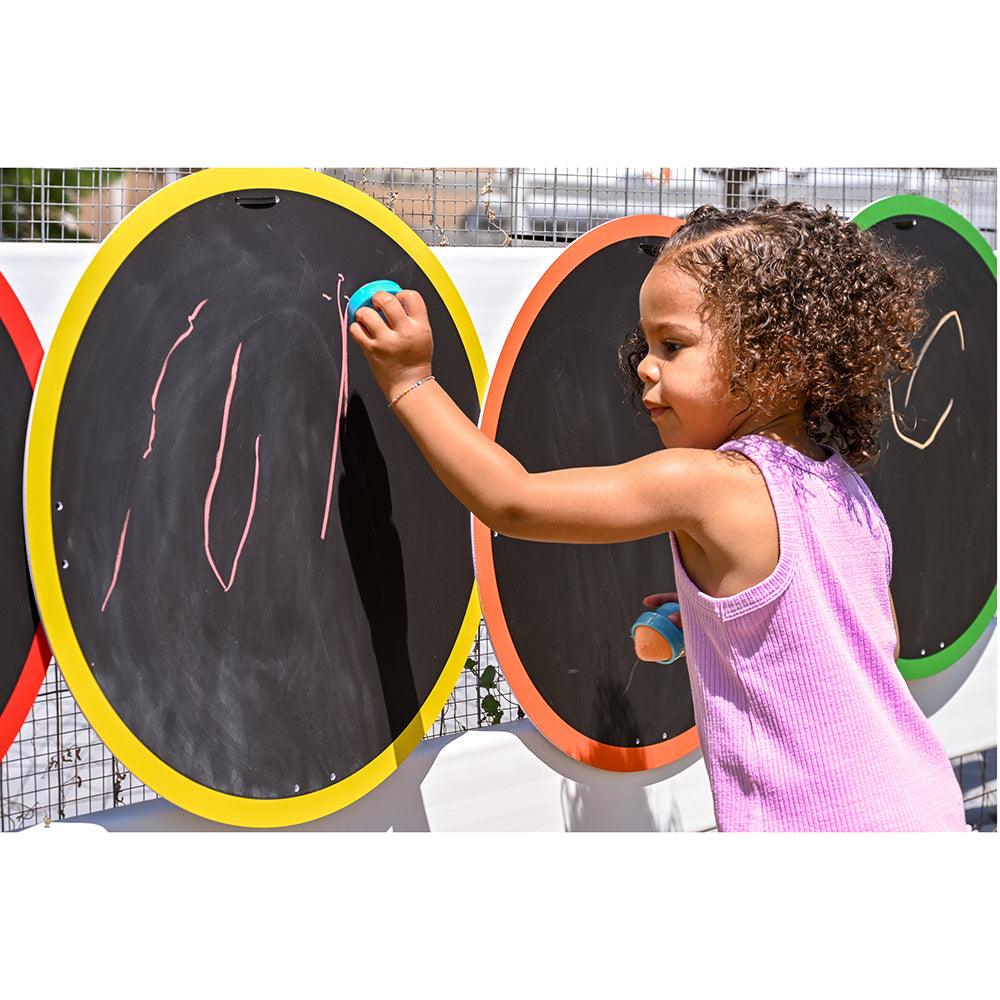 Kid Drawing on Outdoor Chalkboard