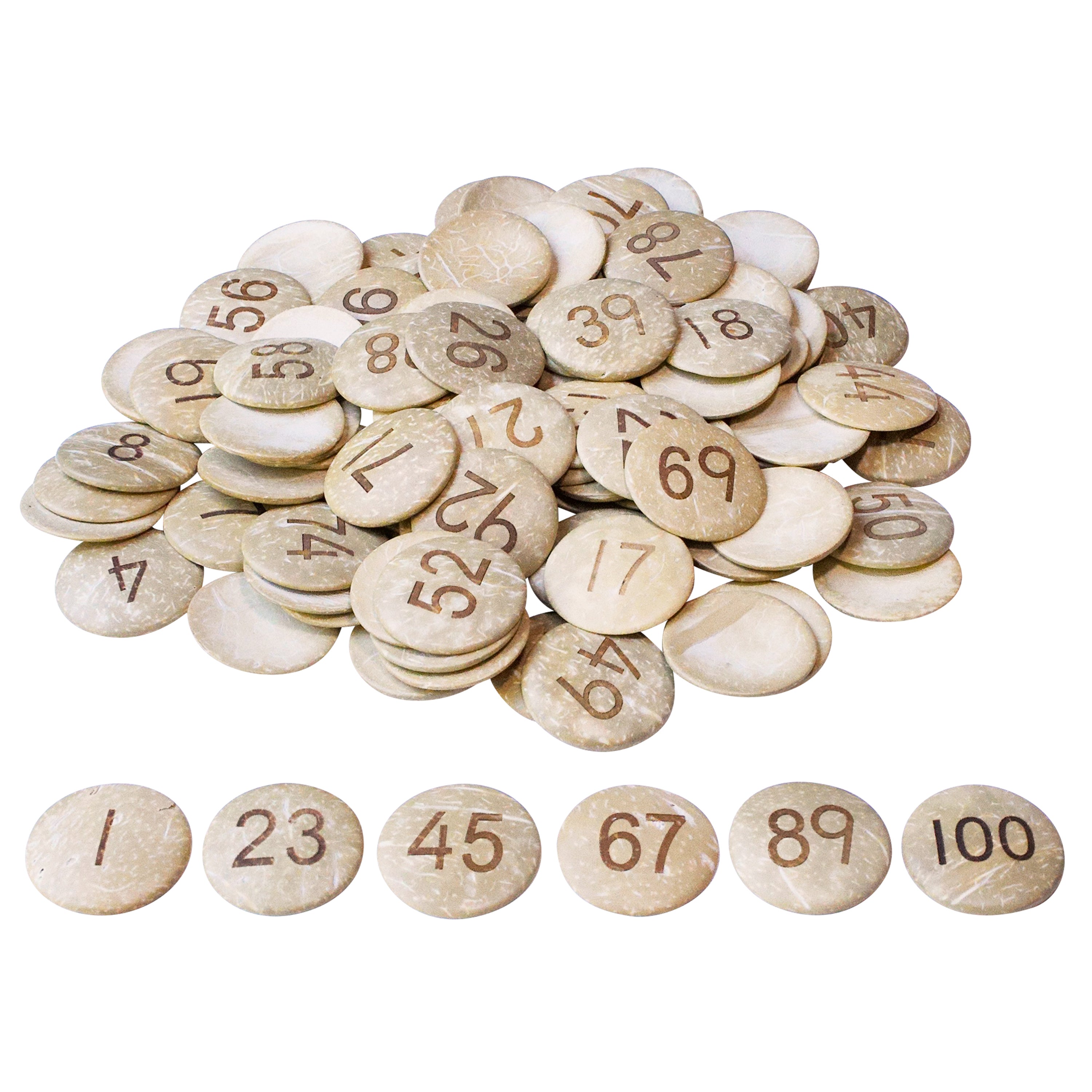 Pile of natural buttons with numbers etched on the surface on a white background