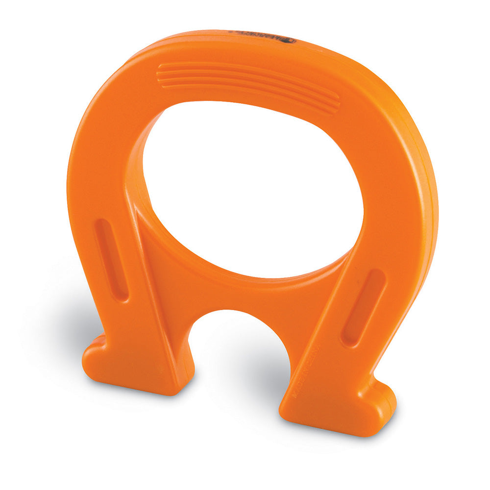 Orange plastic horseshoe on a white background