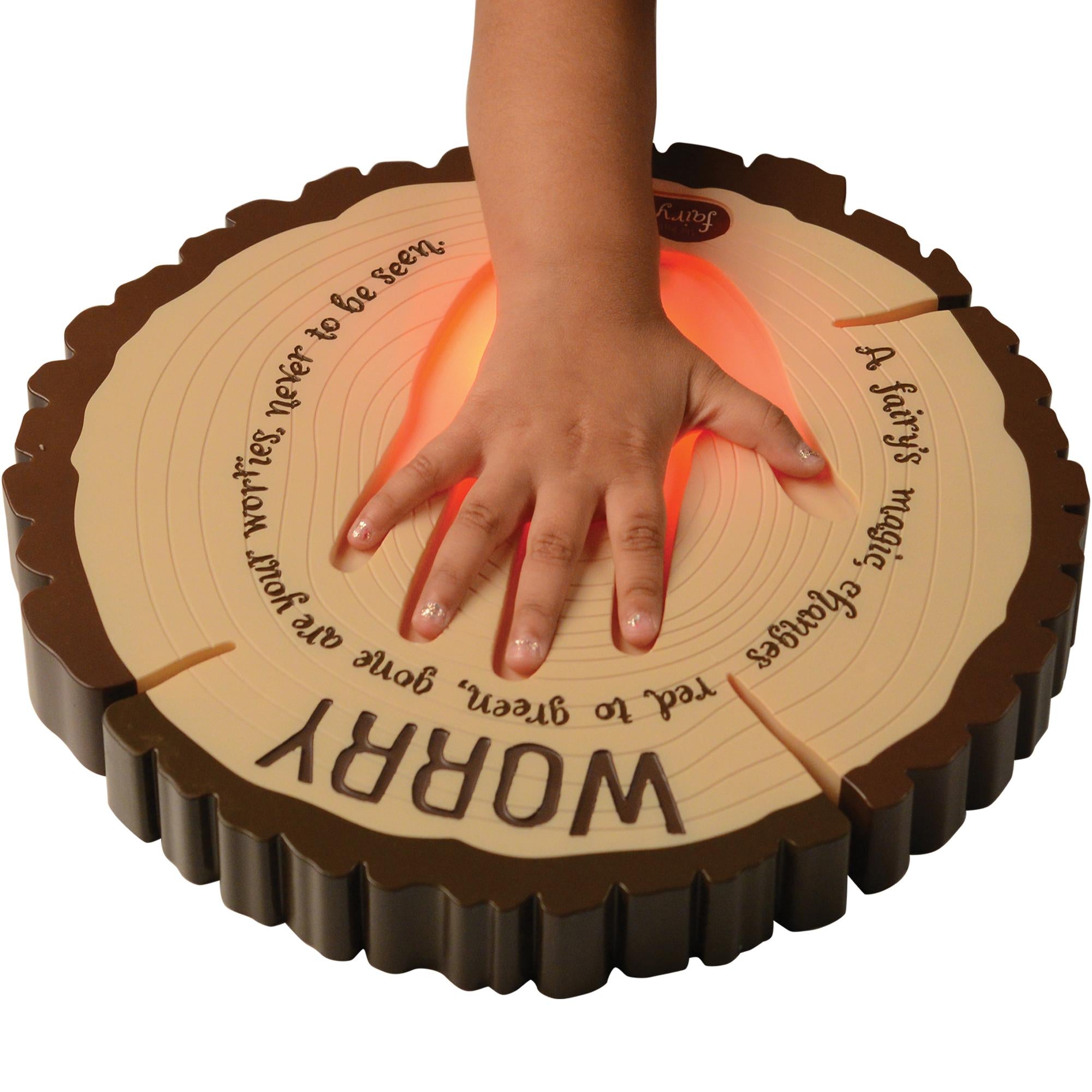 Wooden disc with 'Worry' and handprint, child's hand on top