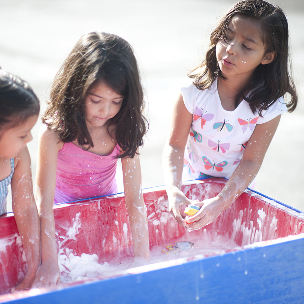 Enjoying Sensory Bubbles with Indoor / Outdoor Water Table