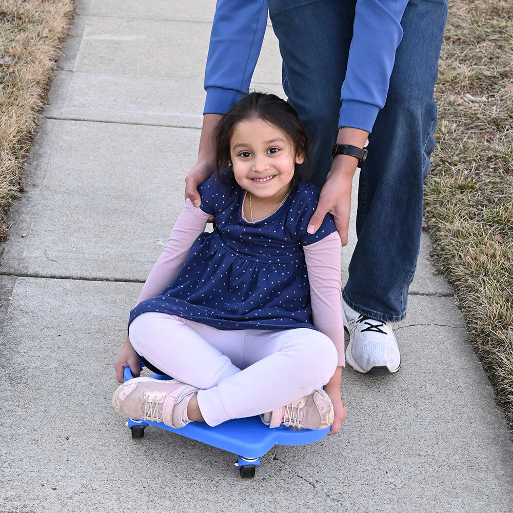 Sitting on Scooter Board With Handles