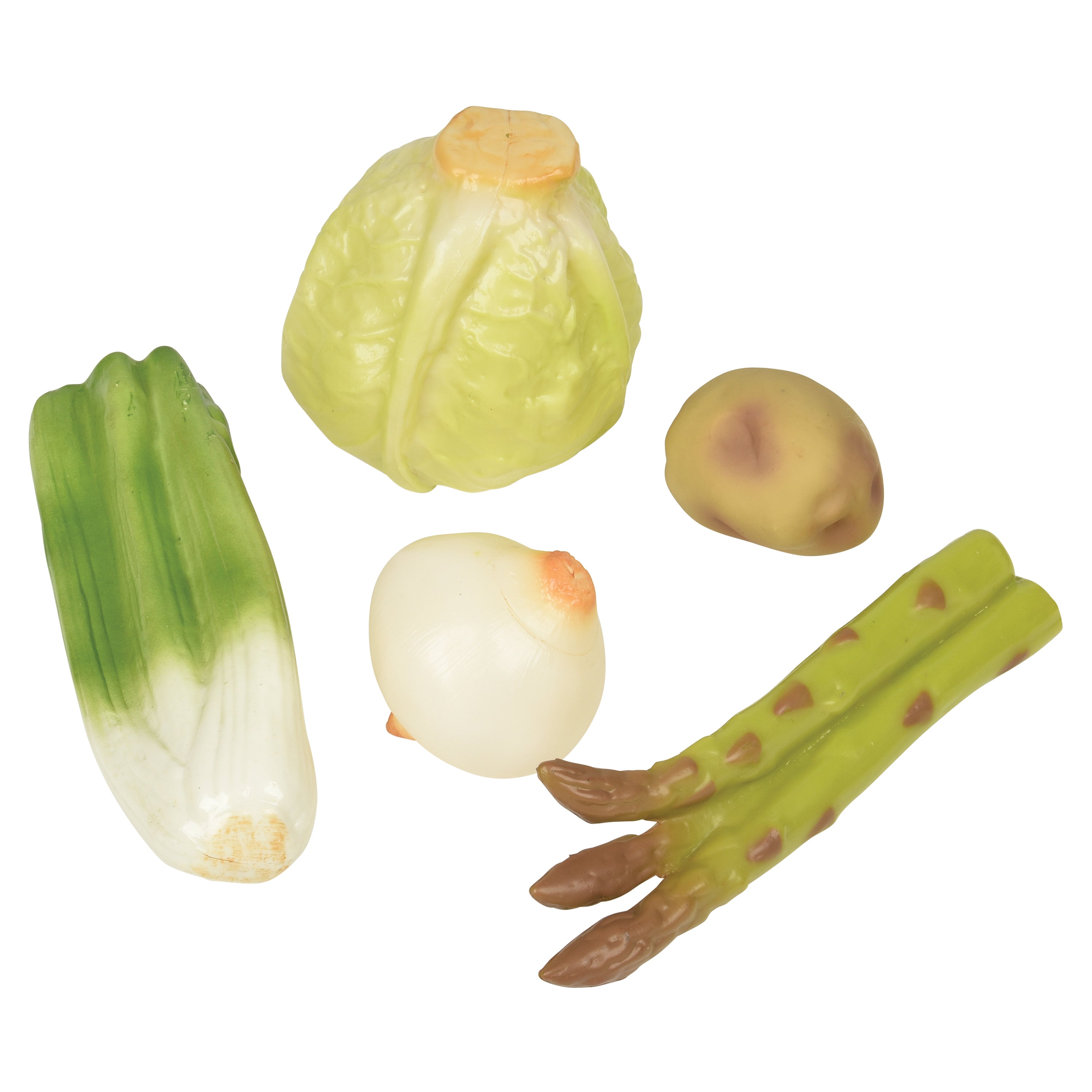 Set of toy vegetables on a white background