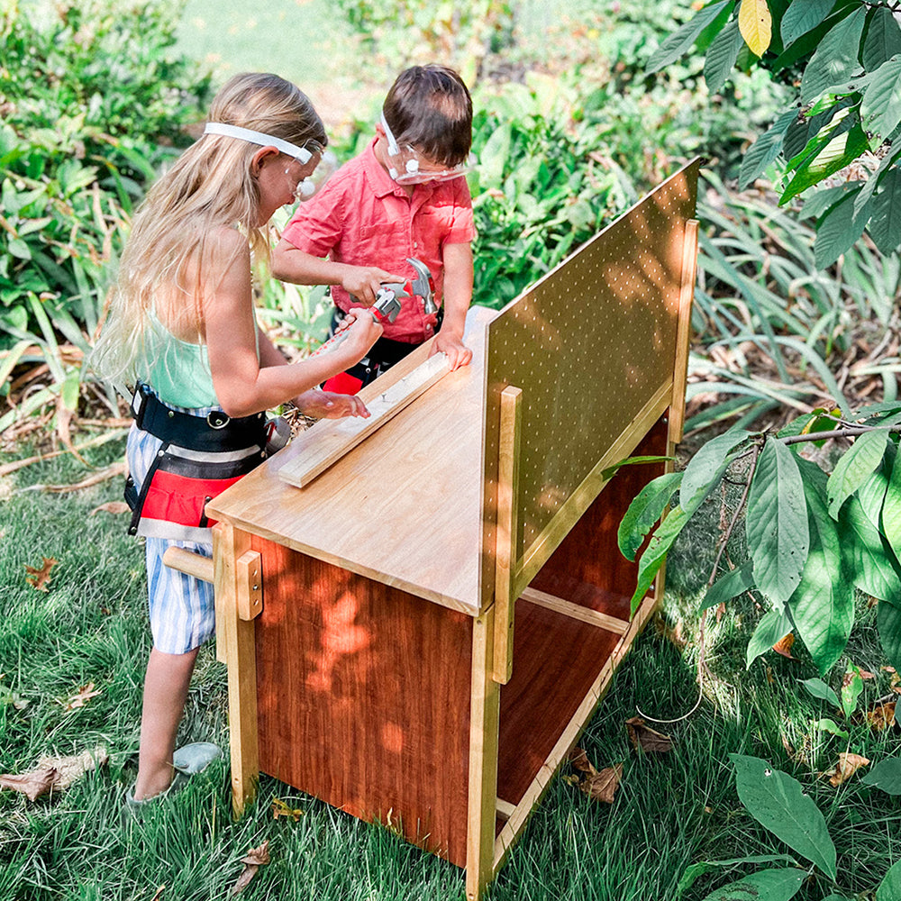 Kids Working with Wood on Carpentry Work Bench