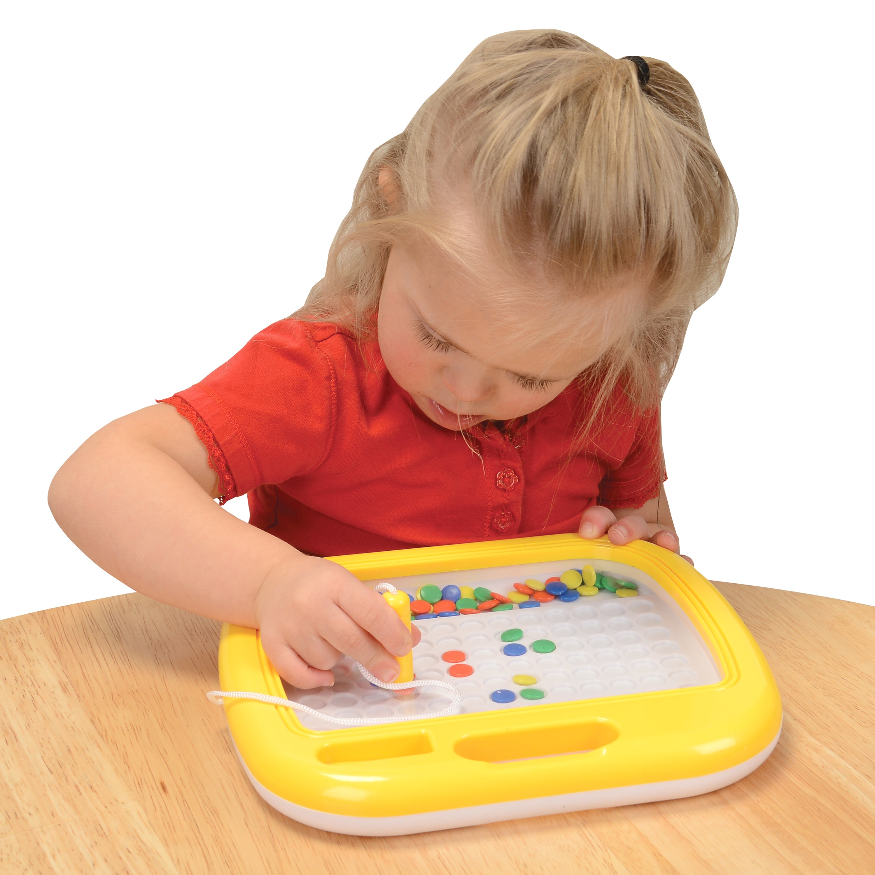 Child Using Wand with Magnetic Mosaic