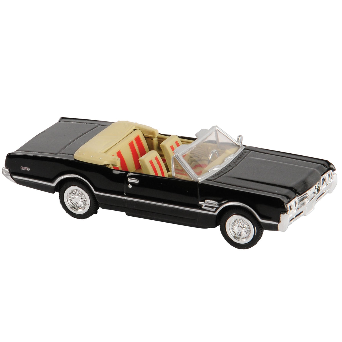 Black classic die-cast convertible toy car with tan interior and silver details