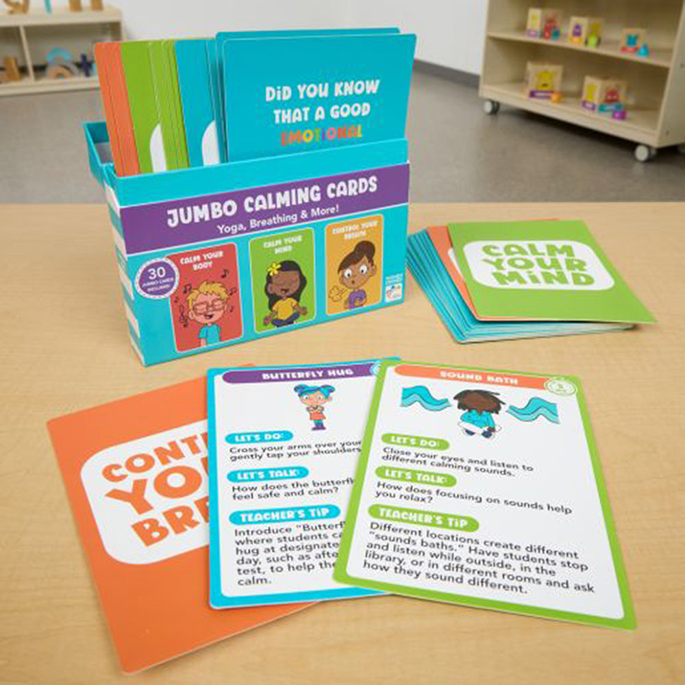 Jumbo calming cards with colorful packaging on a table in a classroom setting