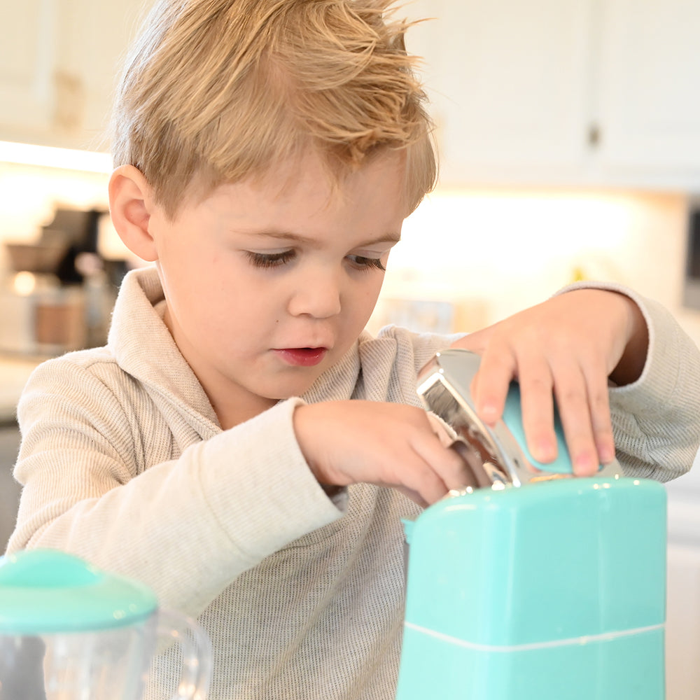 Kid Exploring Realistic Toy Coffee Maker