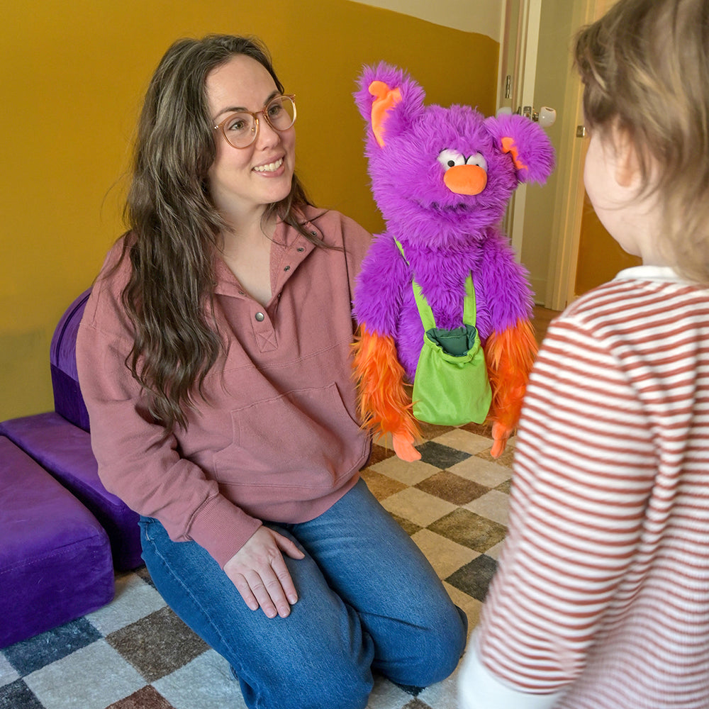 Adult Engaging Toddler with Edgar the Emotions Hand Puppet