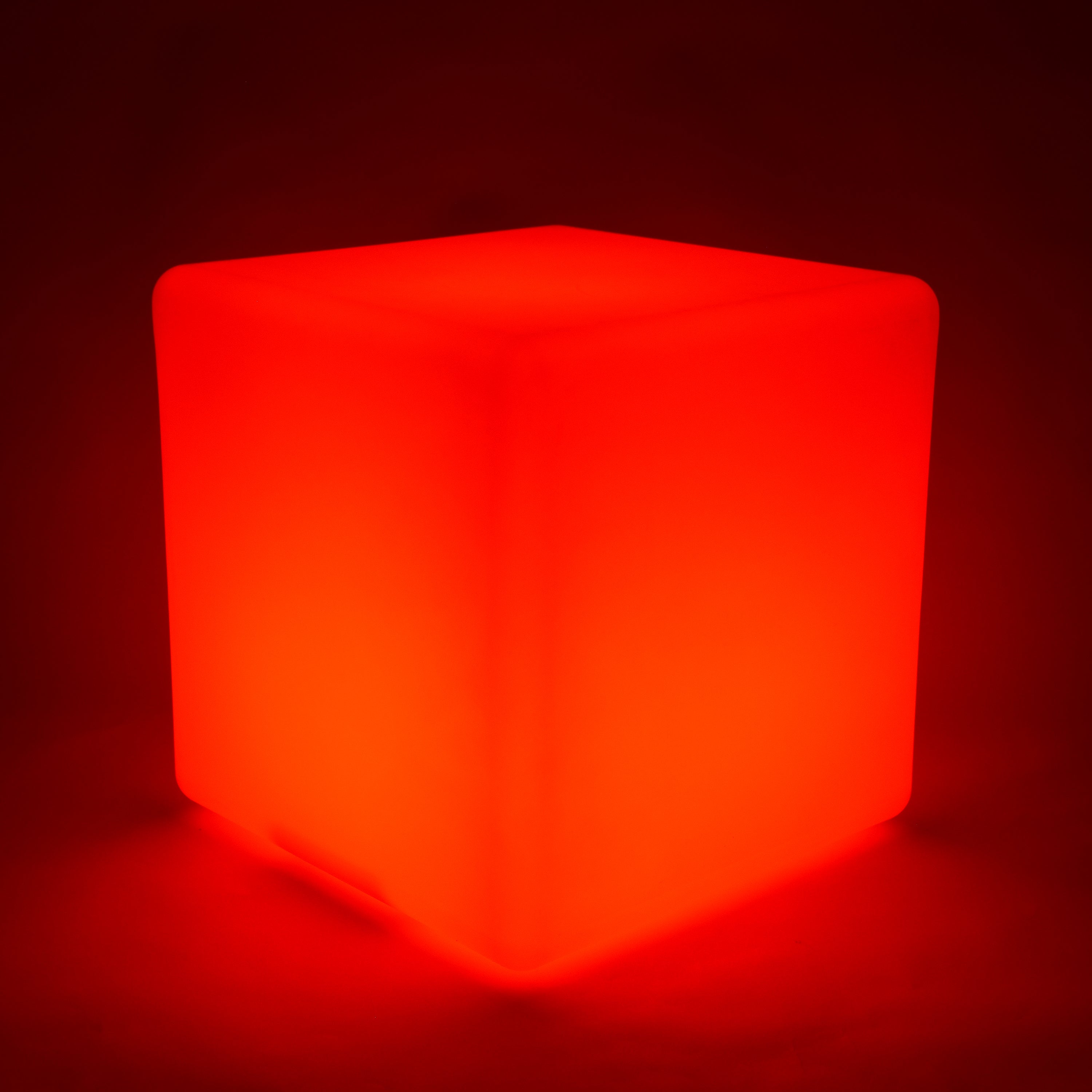 Red glowing cube on a dark background