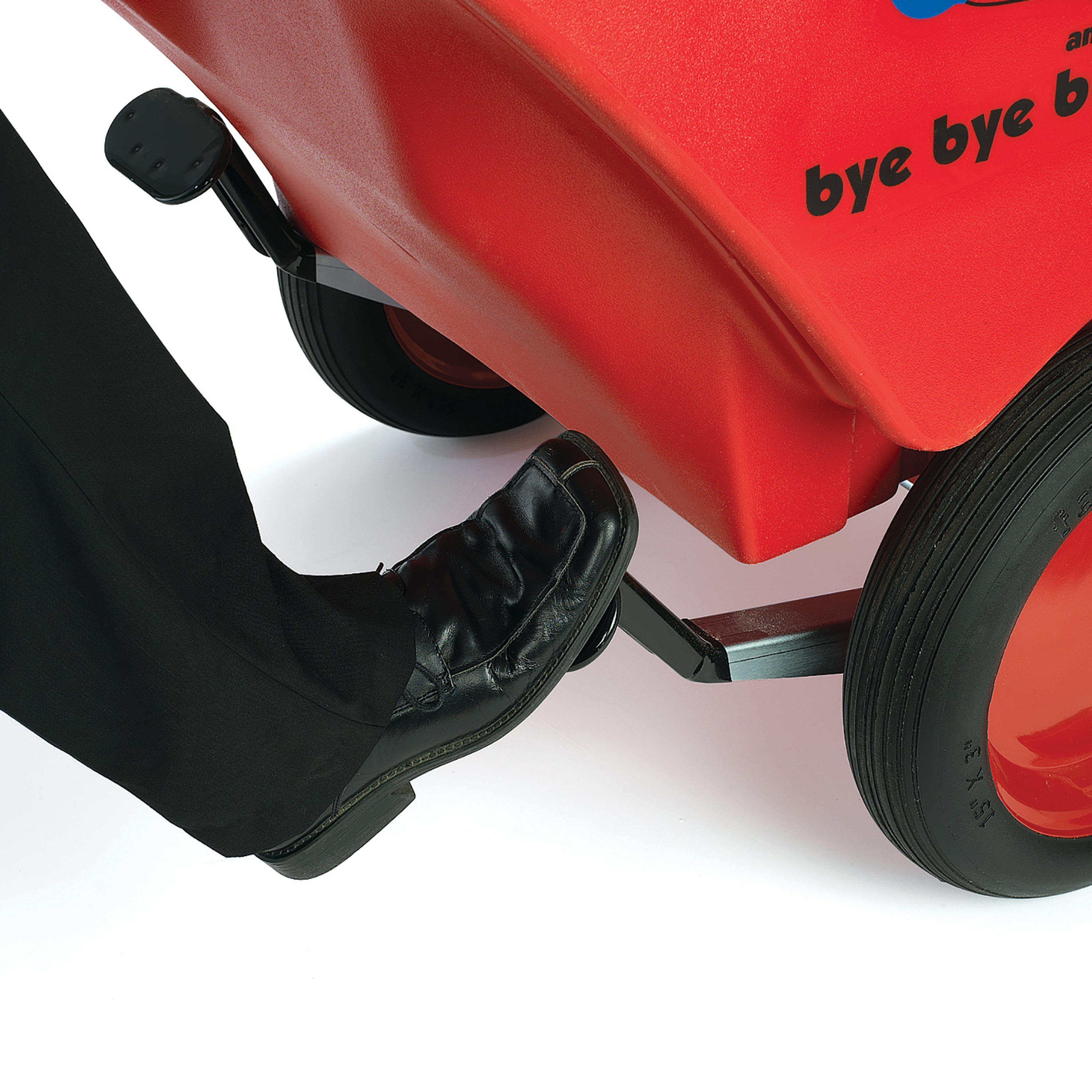 Red stroller with black wheels and handle on a white background
