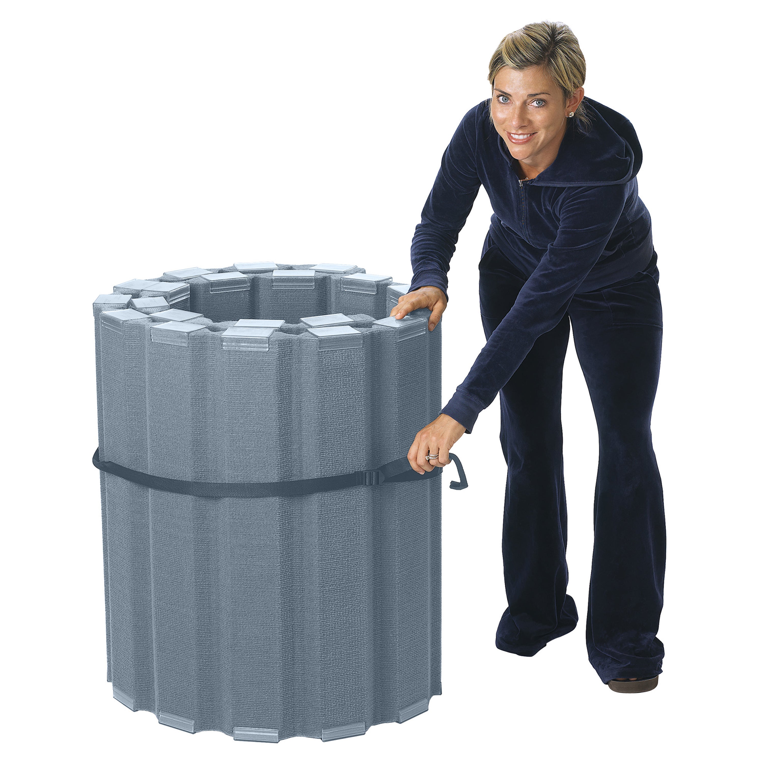 Woman pushing a large gray folded divider on a white background