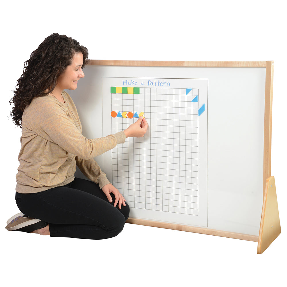 Teacher Using Magnetic Write & Wipe Graphing Chart 