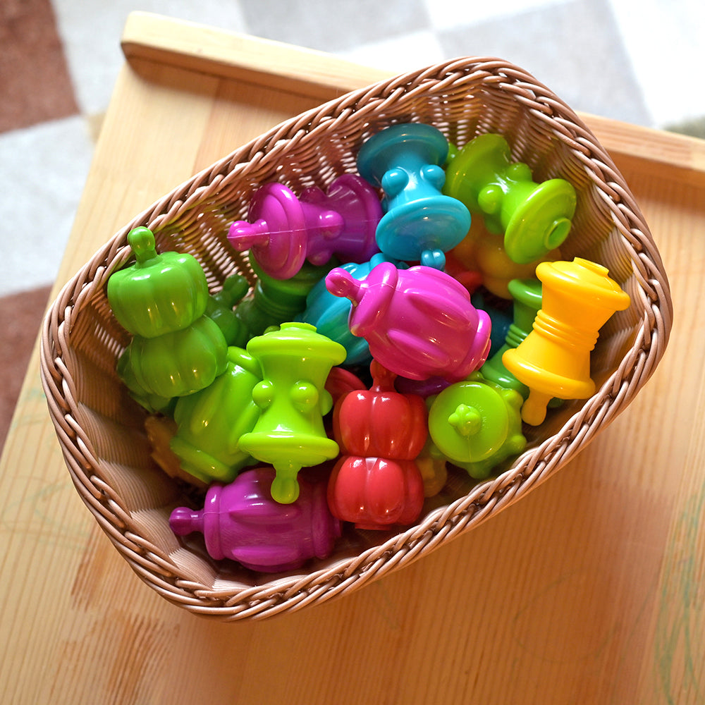 Colorful Snap Beads in a Basket in the Classroom