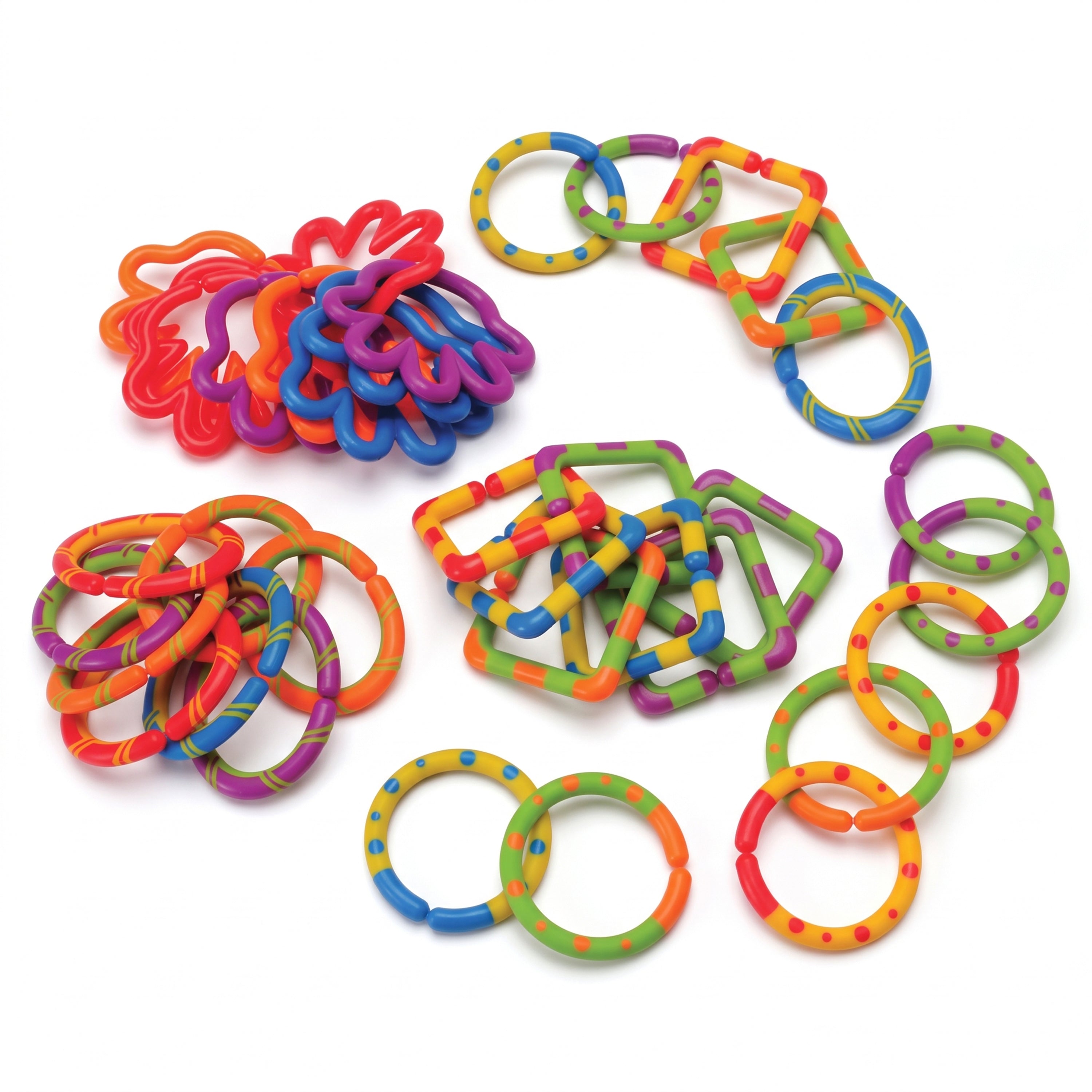 A set of colorful plastic ring toys for babies or toddlers, arranged on a plain white background. The rings come in multiple bright colors including orange, green, blue, purple, and pink, with some featuring dotted patterns.