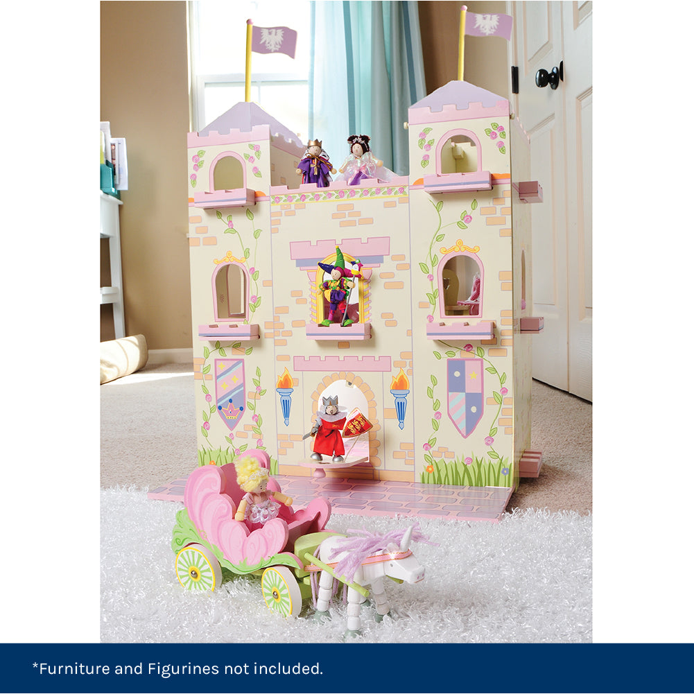 Castle dollhouse with wooden figurines in children's playroom