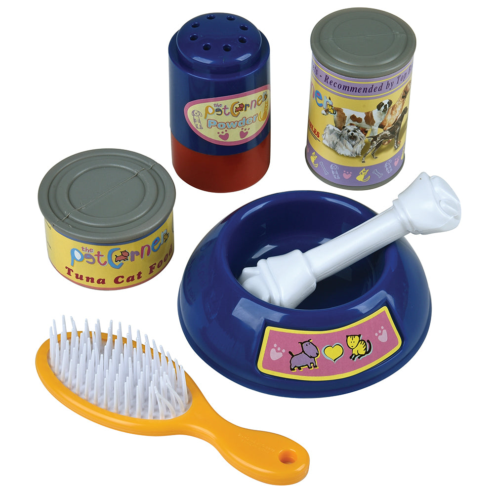 Set of toy pet care items including a brush, bowls, and cans on a white background