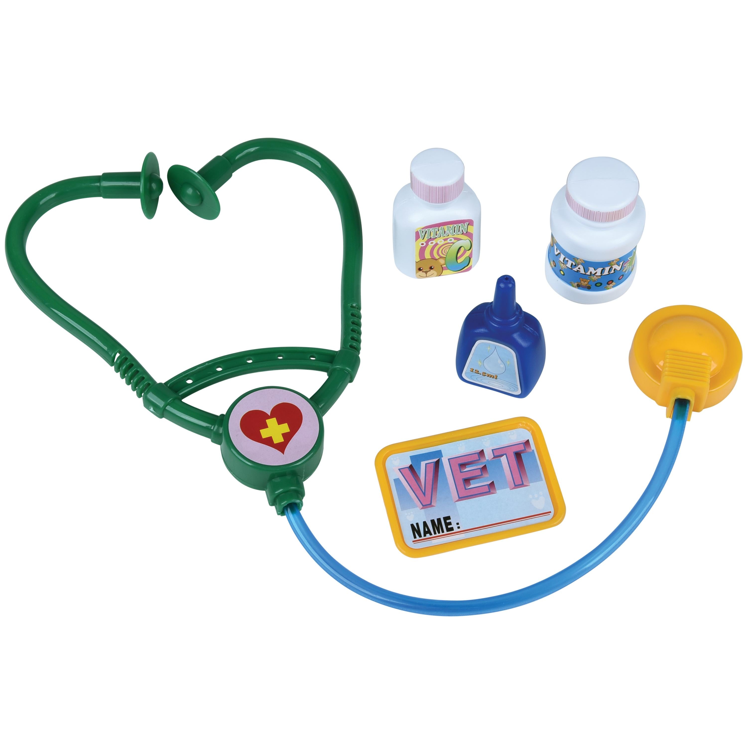 Toy stethoscope with medical accessories on a white background
