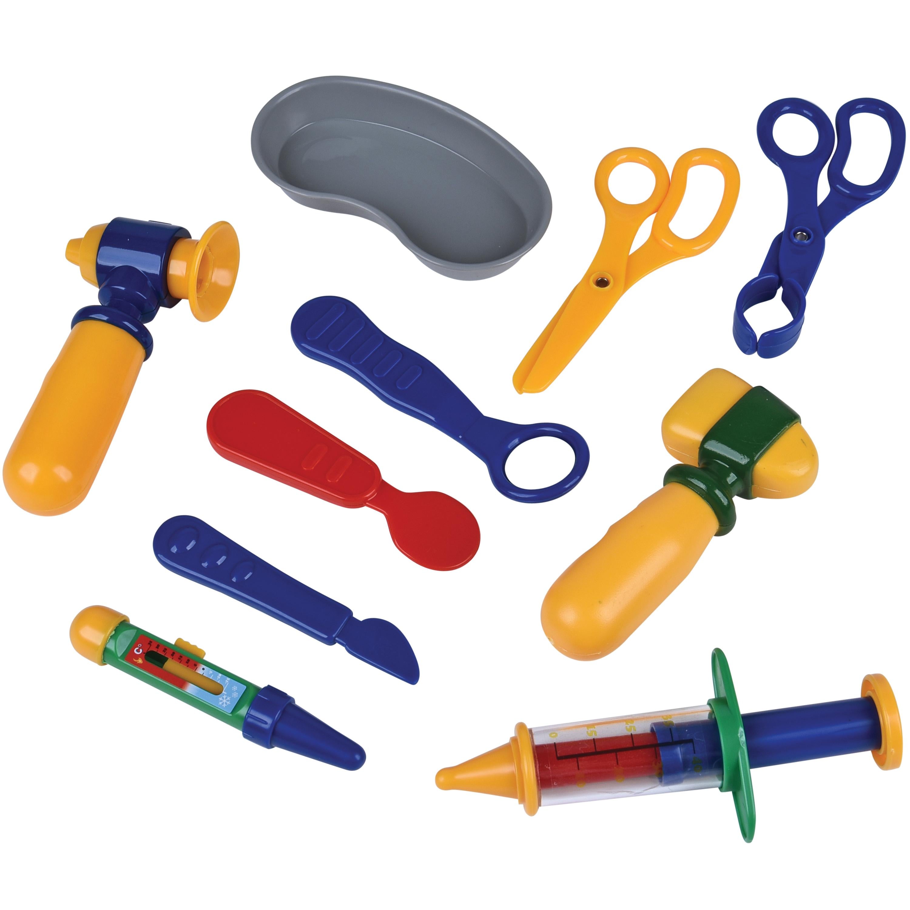 Assorted colorful toy vet utensils on a white background