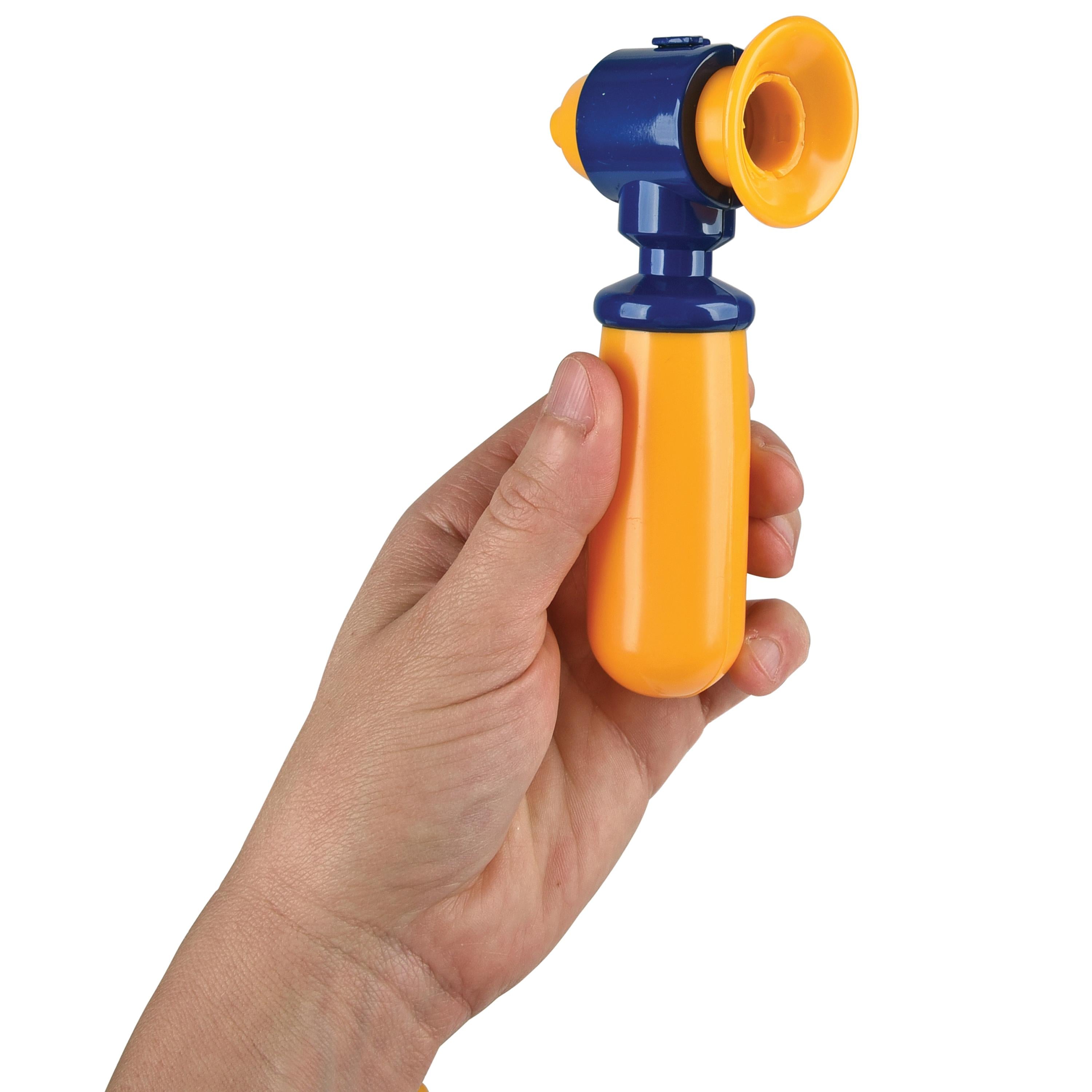 Hand holding a colorful toy ear scope with an orange handle and blue top on a white background