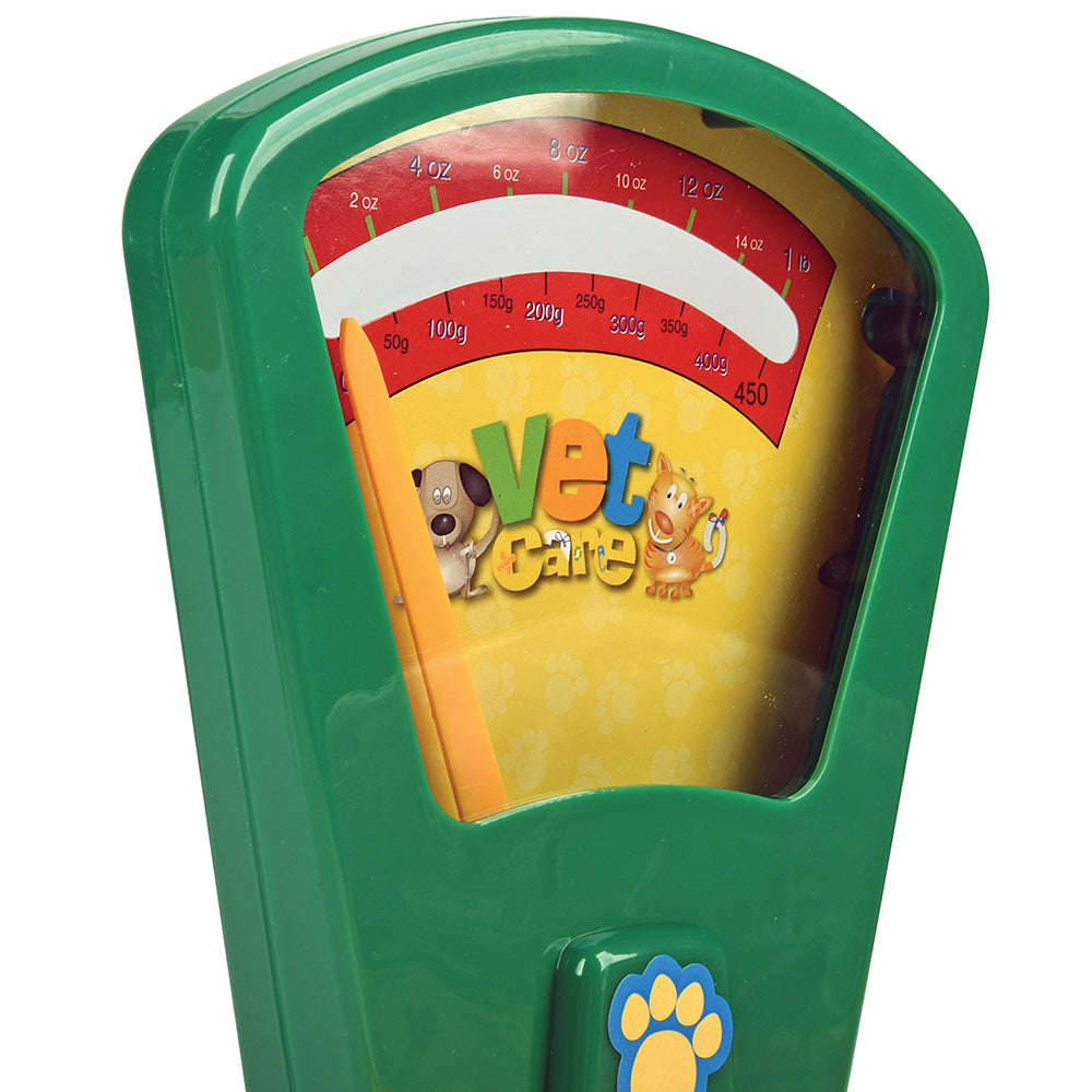 Toy scale with 'Vet Care' branding on a white background