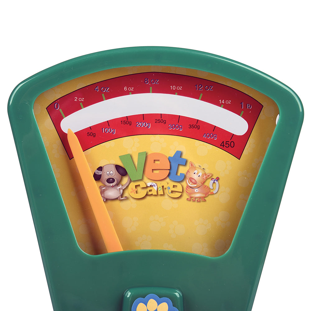Children's toy scale with 'Vet Care' branding on a white background