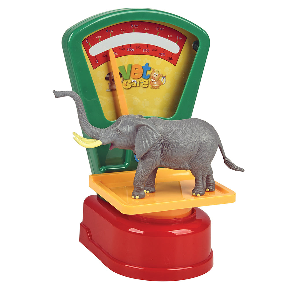 Toy elephant on a scale with colorful display, featuring the 'Vet Care' brand.