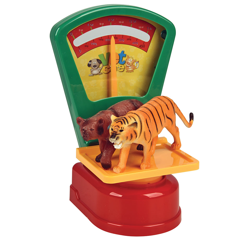 Toy scale with animal figures on a white background